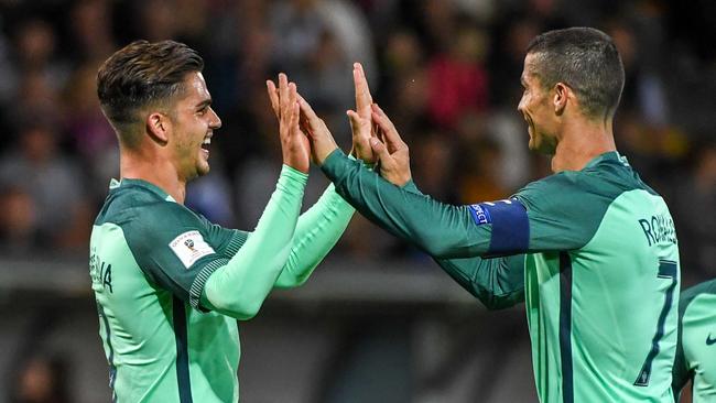 Portugal's Andre Silva (L) and Cristiano Ronaldo.