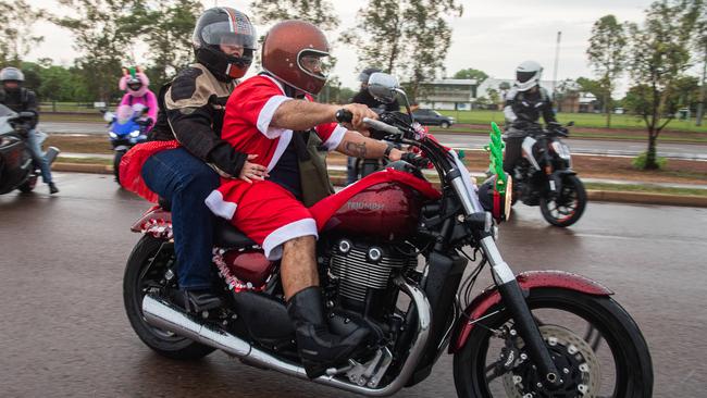 Glenden Rasmussen and Harley Rasmussen joined Darwin's motorbike community at the NT Motorcycle Centre to raise money and awareness for the Salvation Army's annual Christmas Toy Ride. Picture: Pema Tamang Pakhrin