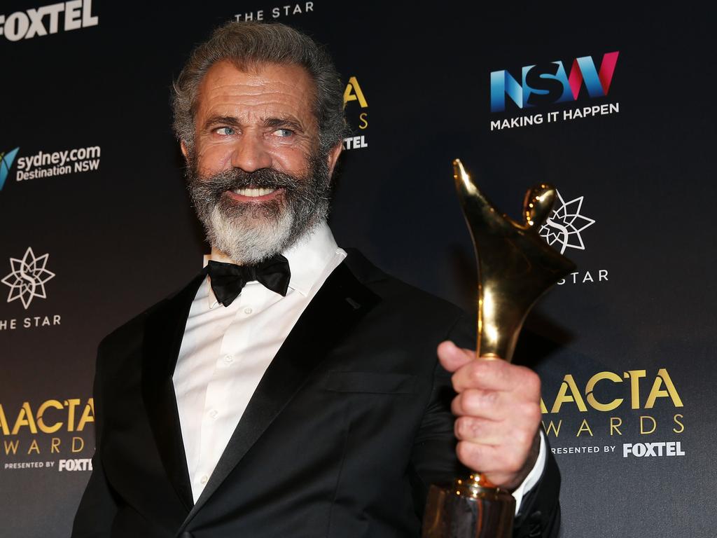 Mel Gibson poses in the media room after winning the AACTA Award for Best Direction for Hacksaw Ridge.