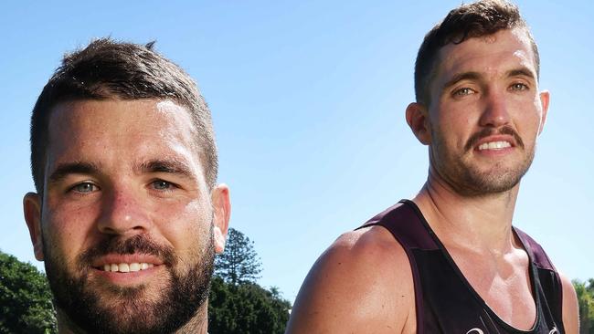 Adam Reynolds and Corey Oates with their boots that are to auctioned for charity, Brisbane Broncos training, Red Hill. Picture: Liam Kidston