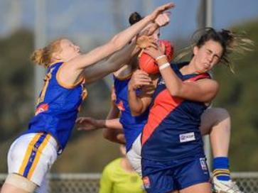 Chloe Molloy take a mark for Diamond Creek in the VFL Women's competition. Picture: Russ Cunham