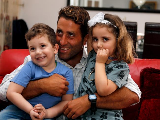 Ali Elamine with his kids Noah and Lahela in Beirut. Picture: Mohamed Azakir/Reuters