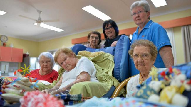 CARING ENVIRONMENT: Resthaven Aged Care residents (front from left) Jean Callighan, Desley Helshan, Freda Younger and (at back) Mavis Parsons, facility manager and co-owner Mary Anne Edwards and diversional therapist Wendy Farley. Picture: Madura McCormack