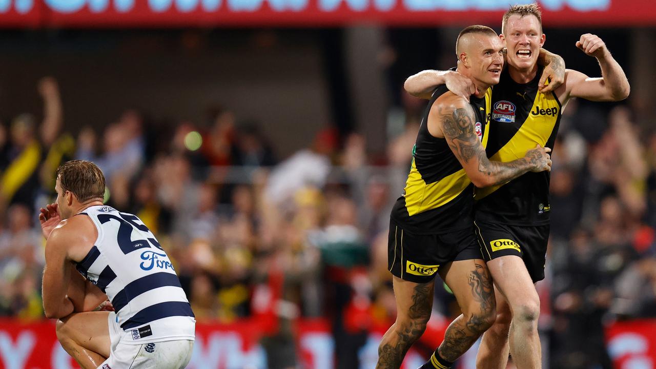 Henderson on the final siren of last year’s Grand Final, as Tigers Dustin Martin and Jack Riewoldt celebrate. Picture: Michael Willson/AFL Photos