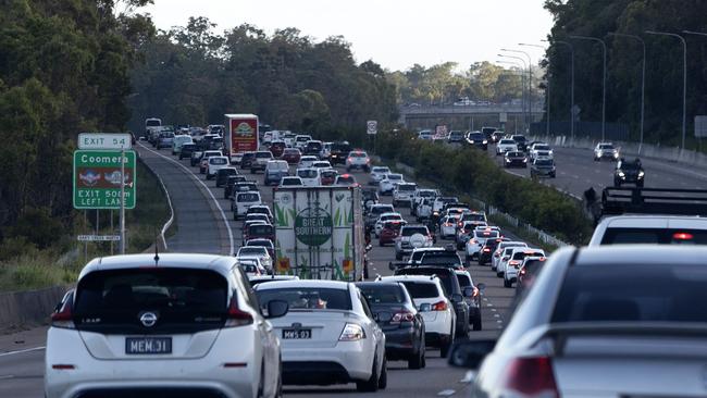 Heavy long weekend traffic heading south on the M1 Pacific Motorway towards the Gold Coast from Brisbane. Picture: Nigel Hallett