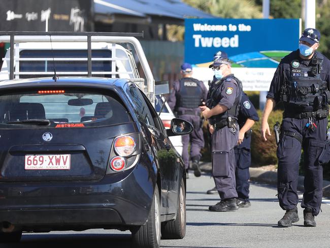 COOLANGATTA , AUSTRALIA - Newswire photos , AUGUST 22, 2021, NSW Police officers stop all vehicles entering Tweed Heads from Coolangatta after "Freedom' protesters gathered on the NSW/QLD border to  protest  over the current Covid-19 Lockdowns surrounding entry into Queensland.Picture: NCA Newswire / Scott Powick