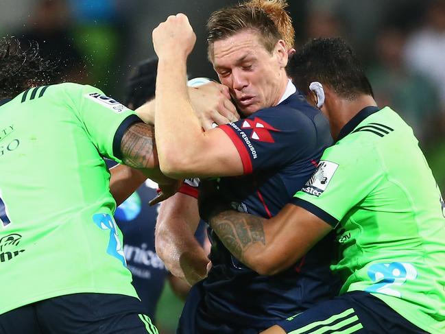 MELBOURNE, AUSTRALIA - MARCH 01: Dane Haylett-Petty of the Rebels is tackled during the round three Super Rugby match between the Rebels and the Highlanders at AAMI Park on March 1, 2019 in Melbourne, Australia.  (Photo by Mike Owen/Getty Images)