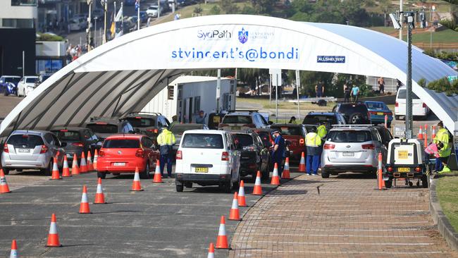 People queue for testing at Bondi Beach. Picture: NCA NewsWire / Christian Gilles