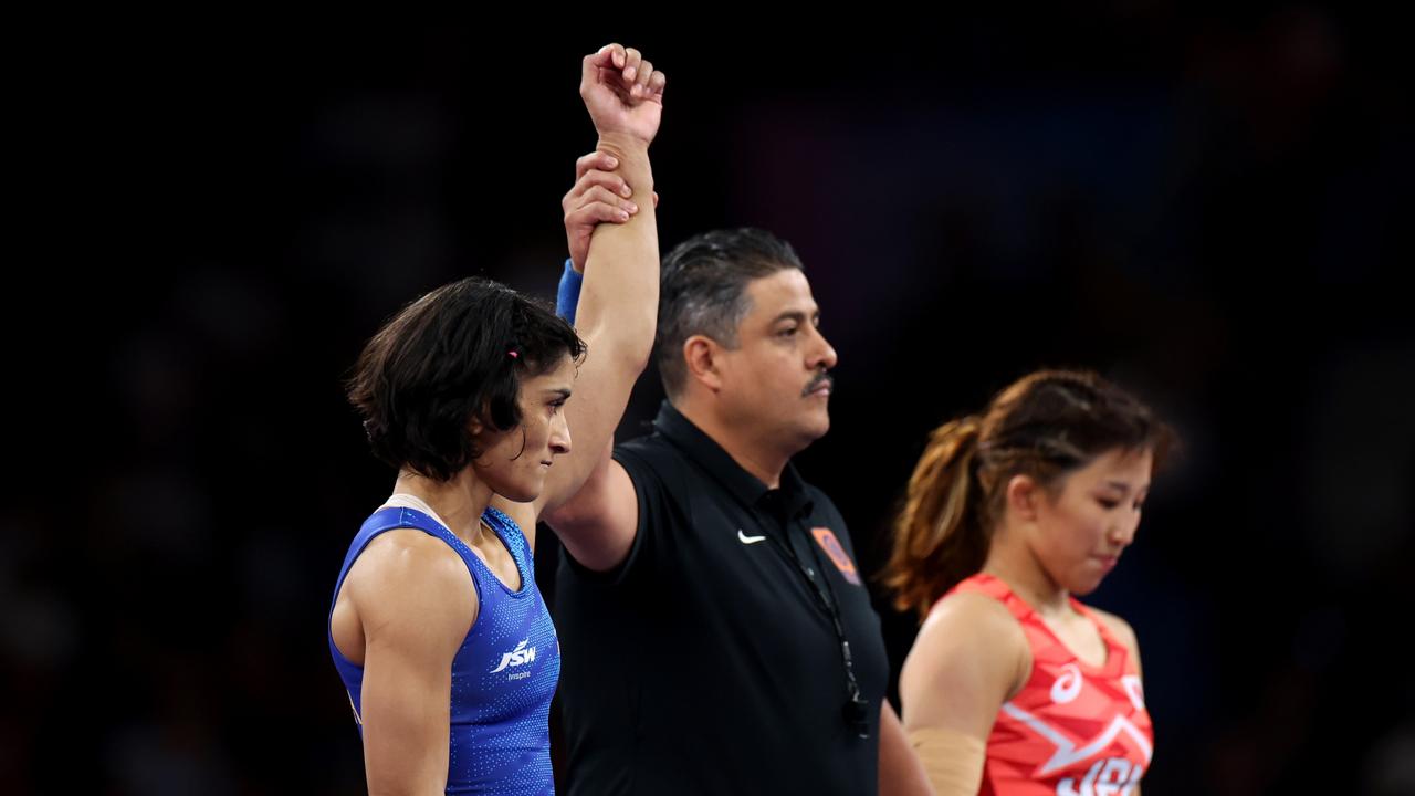 Phogat upset Yui Susaki of Team Japan. (Photo by Luke Hales/Getty Images)