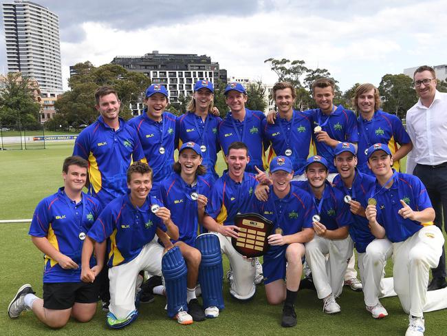 The South East Sharks celebrate winning the Youth Premier League under 18 final over North-West Wizards at the Junction Oval in January. Picture: Julian Smith