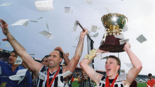 Roger Delaney with Nathan Buckley after Port Adelaide’s 1992 SANFL premiership.