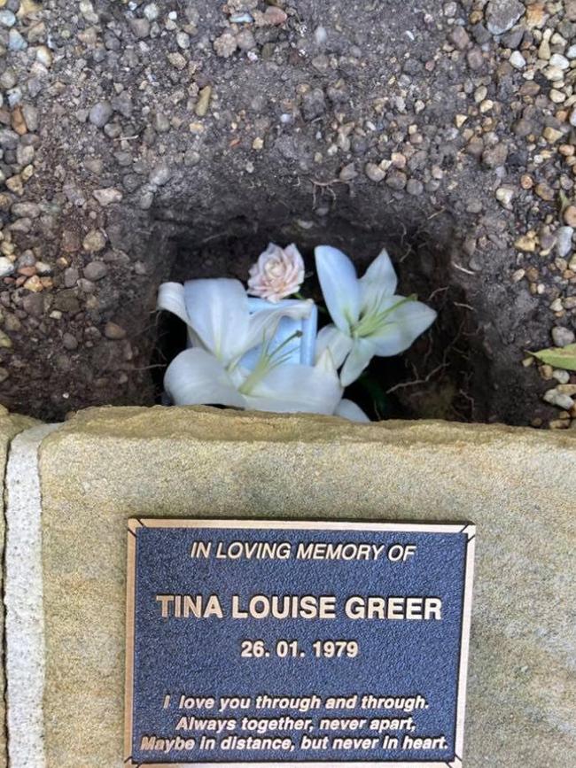 A plaque in memoriam for Tina Greer.