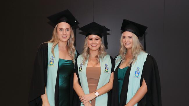 Krystal Schulz, Tori Borghere and Brooke Hamilton at the CQU Cairns mid-year graduatiion ceremony, held at the Cairns Convention Centre. Picture: Brendan Radke