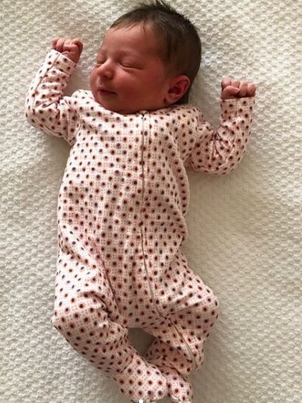 Crows defender Daniel Talia and wife Megan have welcomed their first child, Ivy Grace. Picture: Instagram.