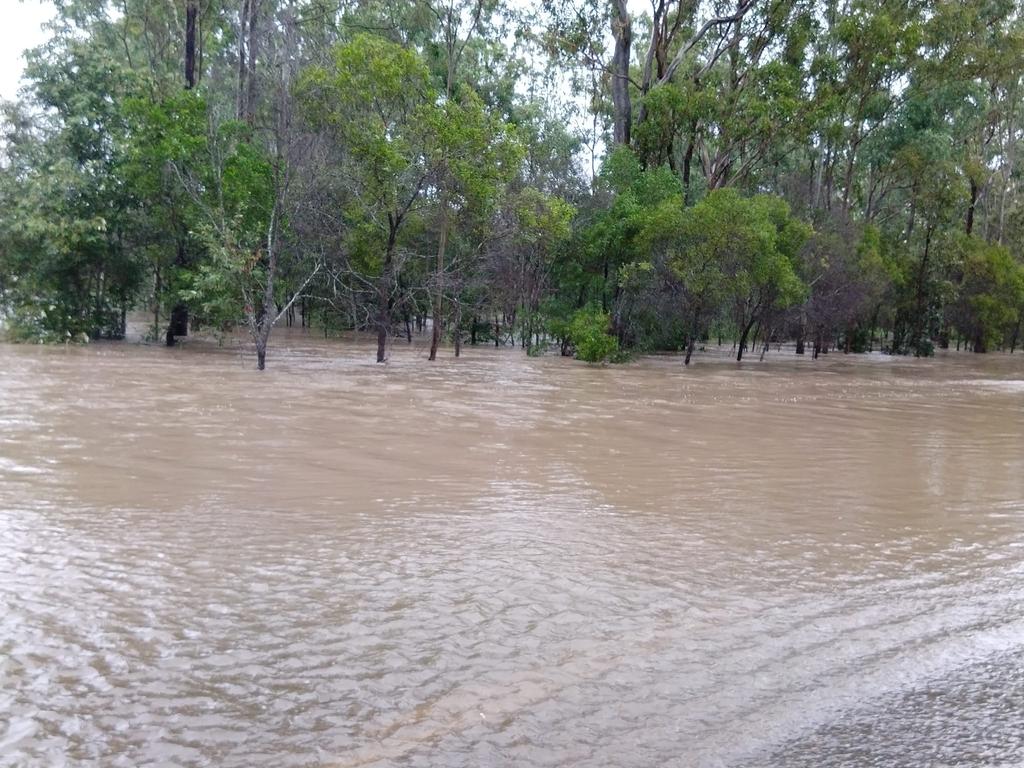 Photos of 1m of water over Beresford Rd Boompa on the Biggenden/Maryborough Rd. Picture: Hayden Beresford