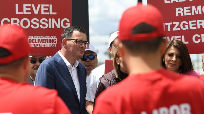 Victorian Premier Daniel Andrews seen with Labor Party supporters wearing red shirts at Deer Park train station in 2018. Picture: Julian Smith