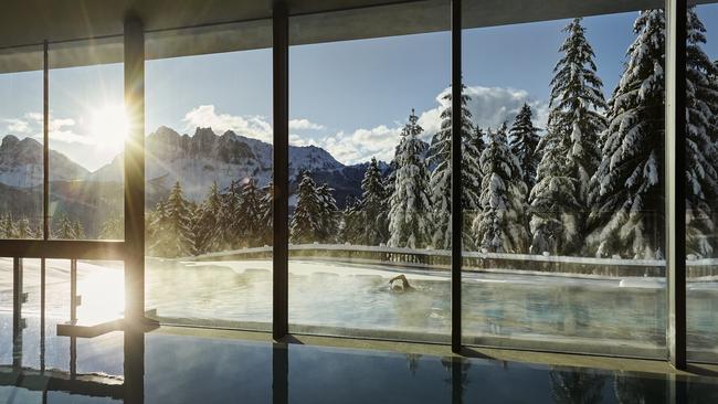 The pool at Forestis Dolomites is swimmable even in winter.