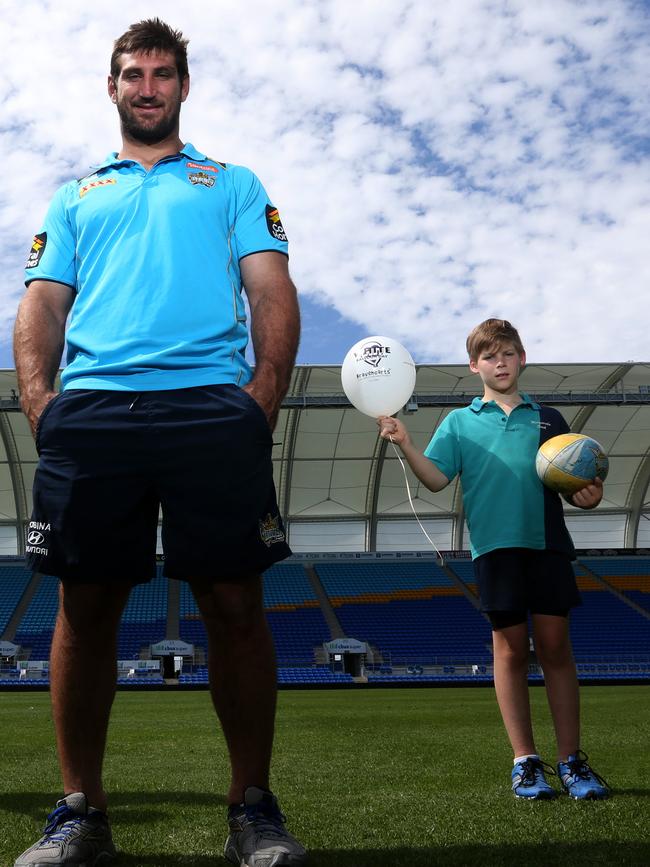 Former Titans player Dave Taylor with a then 10-year-old Shannon Donaldson. Picture: Regi Varghese