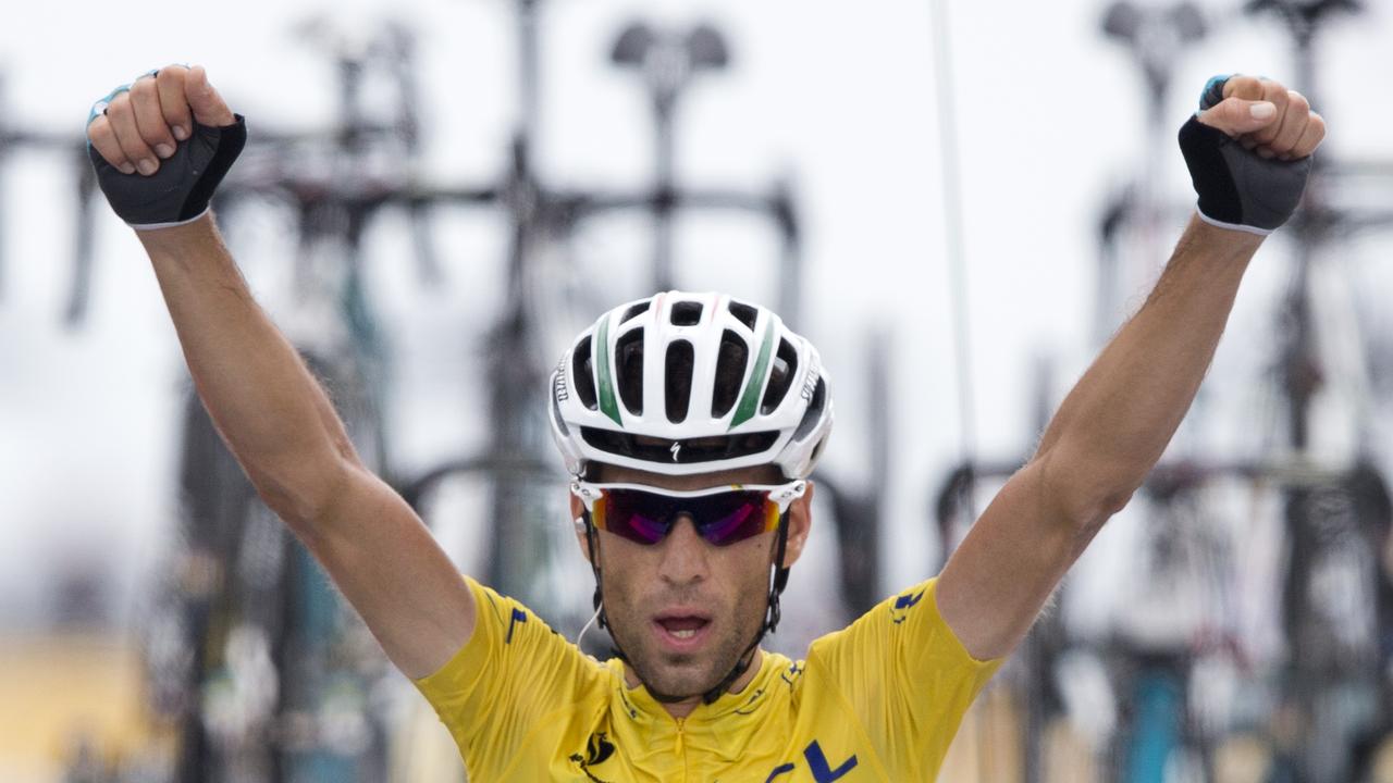 Italy's Vincenzo Nibali crosses the finish line to win the eighteenth stage of the Tour de France cycling race over 145.5 kilometers (90.4 miles) with start in Pau and finish in Hautacam, Pyrenees region, France, Thursday, July 24, 2014. (AP Photo/Peter Dejong)