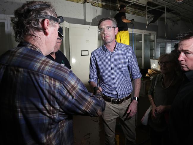 Premier Dominic Perrottet tours the Lismore CBD to see the flood devastation. Picture: Toby Zerna