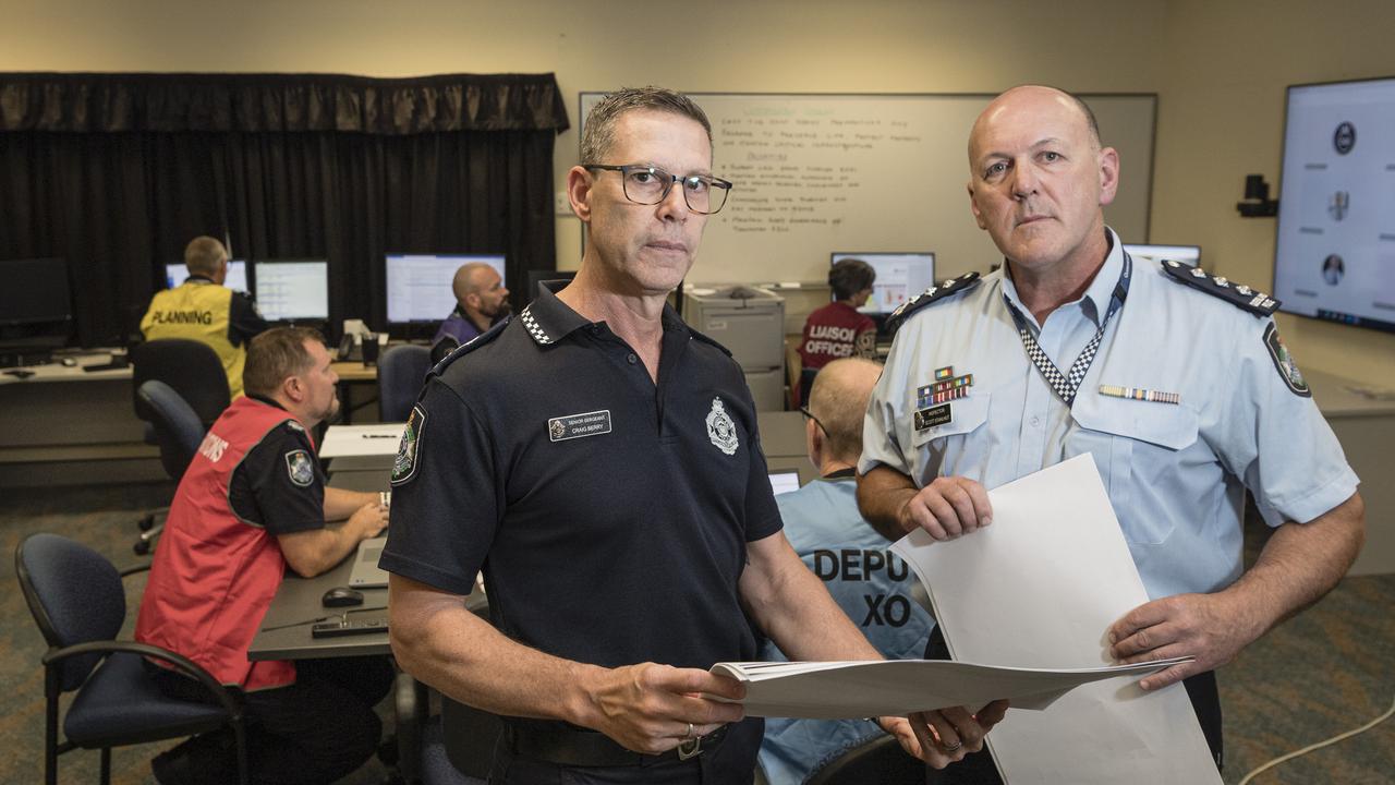 Darling Downs Disaster Management Officer Senior Sergeant Craig Berry (left) and Inspector Scott Stahlhut in the Darling Downs District Disaster Coordination Centre as emergency services prepare for the arrival of the weather system associated with TC Alfred, Thursday, March 6, 2025. Picture: Kevin Farmer