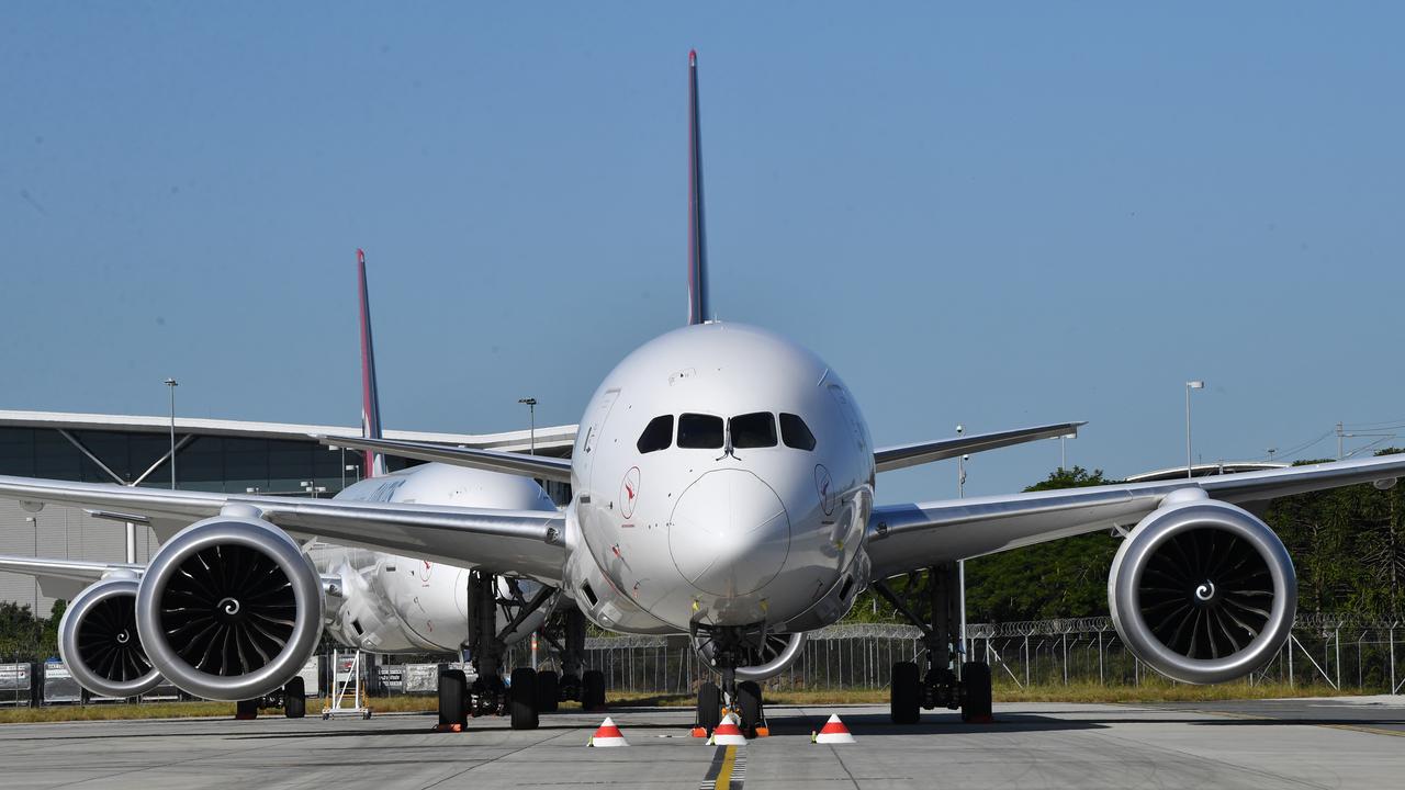 Grounded Qantas aircraft parked at Brisbane Airport. Picture: Darren England/AAP