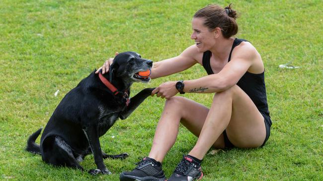 Crows AFLW co-captain Chelsea Randall and her dog Koda. Picture: Brenton Edwards