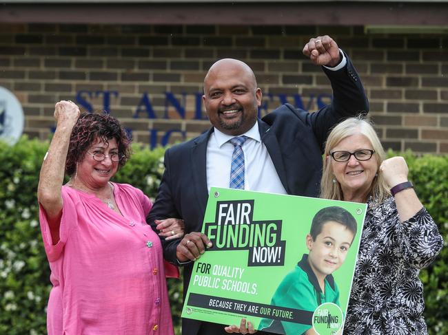 NSW Teachers Federation acting president Henry Rajendra (centre). Picture: AAP Image