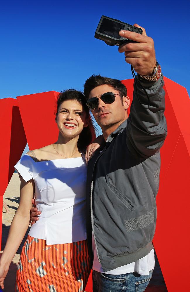 Zac Efron and Alexandra Daddario who star in the movie Baywatch, pictured on Bondi Beach to promote the movie. Picture: Toby Zerna