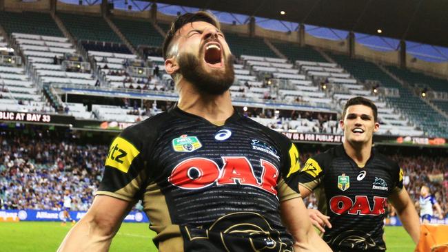 Josh Mansour celebrates a try for the Panthers.