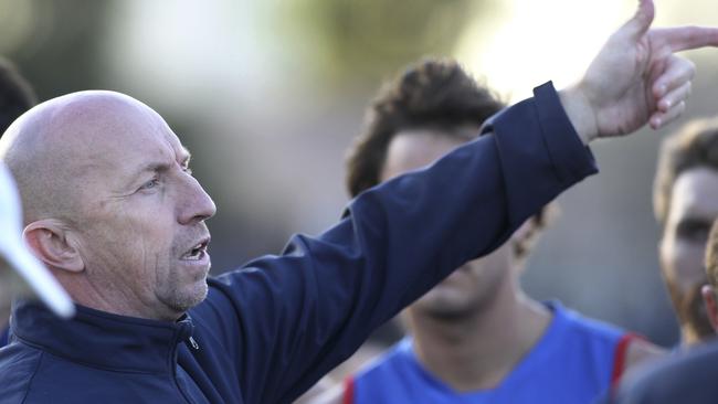 Your opponent went that way. Dogs Roy Laird chats with his players. Picture: Dean Martin/AAP