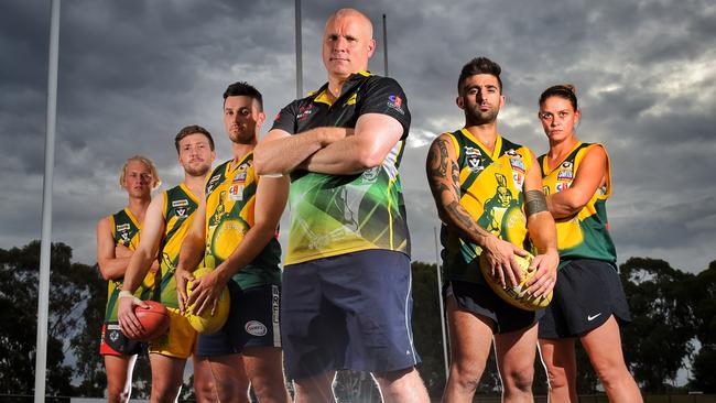 Coach Nick Smith (centre) with players from the Werribee Centrals in the Geelong &amp; District Football League. Picture: Tony Gough