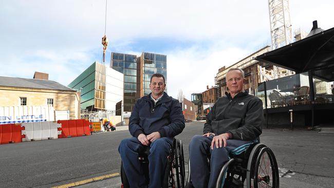 David Cawthorn and Jim Busby speaking about disabled access to Parliament Square that is currently under construction. Picture: LUKE BOWDEN