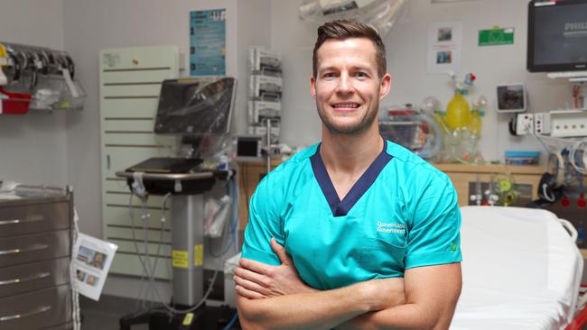 Registered Nurse Daniel Ronnfeldt has traded a busy life at the Gold Coast University Hospital’s ED to run coronavirus fever clinics. Picture: Tertius Pickard