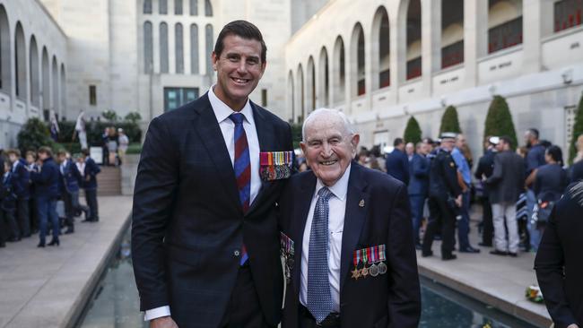 WWII veteran Gordon Richardson, 96, greets VC winner Ben Roberts-Smith at a Last Post Ceremony. Picture by Sean Davey