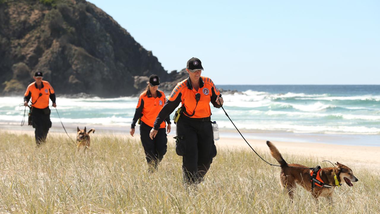 Search Dogs Sydney group comb the dunes of Tallow Beach, Byron Bay, Theo Hayez’s last known location before he vanished off the radar. Picture: Lyndon Mechielsen/The Australian