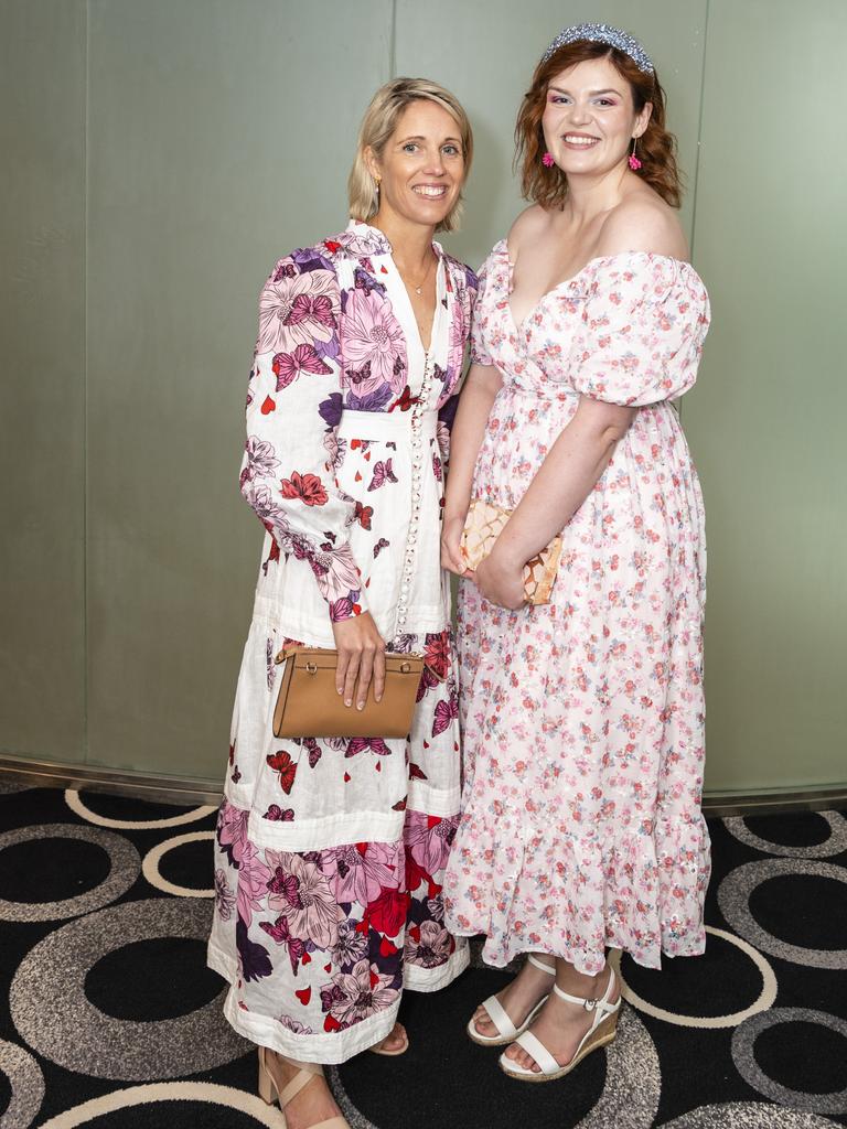 Kiriley Grover (left) and Christie-Lee Johnston at the Melbourne Cup luncheon hosted by Rotary Club of Toowoomba City raising funds for Protea Place, Tuesday, November 1, 2022. Picture: Kevin Farmer