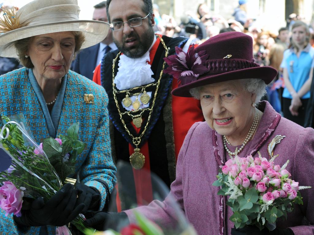 Queen Elizabeth ll, accompanied by her lady-in-waiting, Lady Susan Hussey, during a walkabout to mark her Diamond Jubilee on April 30, 2012. Picture: WireImage