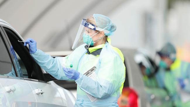 Medical professionals conduct a nasal swab test at a testing centre in Bondi Beach. Picture: GetTY