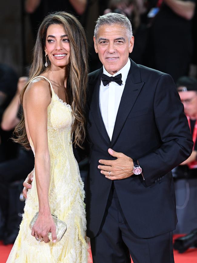 Amal Clooney and George Clooney attend the screening of <i>Wolfs</i> during the 81st Venice International Film Festival in Venice, Italy. Picture: Matrix Pictures