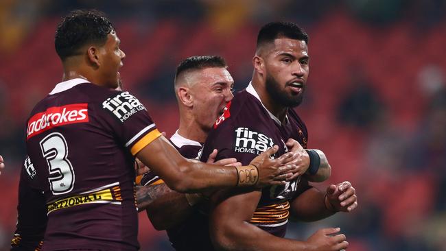 BRISBANE, AUSTRALIA – AUGUST 13: Payne Haas of the Broncos celebrates a try during the round 22 NRL match between the Brisbane Broncos and the Sydney Roosters at Suncorp Stadium, on August 13, 2021, in Brisbane, Australia. (Photo by Chris Hyde/Getty Images)