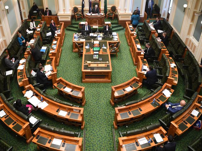 A reduced number of members due to social distancing measures is seen during Question Time at the Queensland Parliament in Brisbane, Wednesday, April 22, 2020. Queensland has recorded no new cases of coronavirus in the past 24 hours. (AAP Image/Dan Peled) NO ARCHIVING