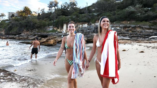 Friends Anna Rushworth and April Hamilton seek temporary respite from the El Nino heat at Gordons Bay, at Sydney’s Coogee, on Tuesday. Picture: Jane Dempster