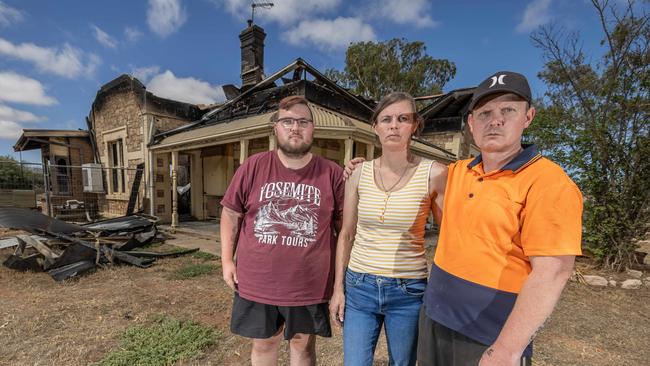 Kim and Daniel Pearce with Benjamin Frith, 24 at the property. Picture: Ben Clark