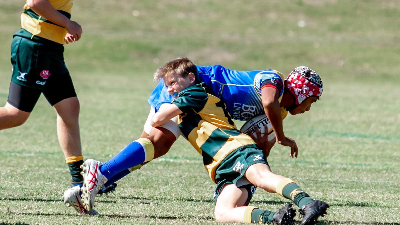 Toowoomba rugby union junior star Aiden Day makes a tackle.