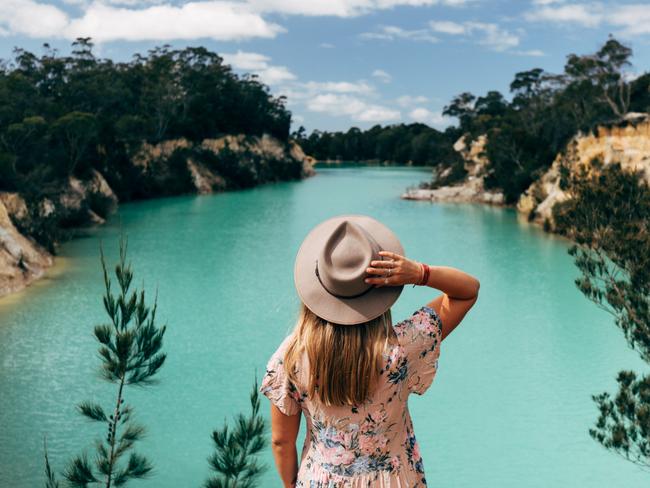 For TasWeekend, summer edition. Picture: Melissa FindleyLittle Blue Lake, just metres off the B82 between Derby and Gladstone, is a natural phenomenon resulting from the pioneering mining days of Poonerluttener / Mount Cameron and the surrounding areas of the Far North East of Tasmania. Originally a mine hole, the lake reflects a vivid aqua blue from the minerals in its base. Now popular with locals for waterskiing, swimming is, nevertheless, not recommended due to the high mineral content in the water.