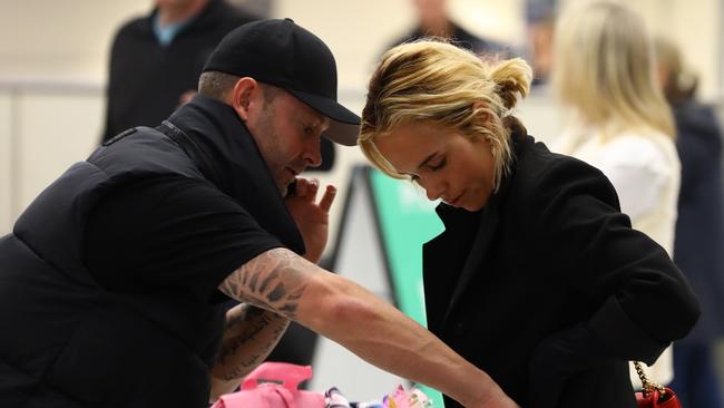 Clarke with Pip Edwards at Sydney Airport after a recent holiday in Noosa. Picture: Matrix