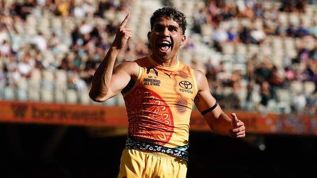 Tyson Stengle celebrates a goal for the Indigenous All Stars. Picture: Dylan Burns/AFL Photos via Getty Images.