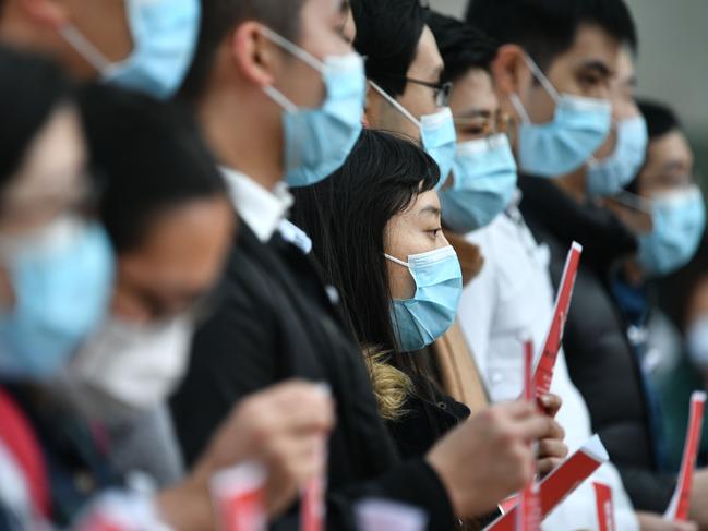 Local medical workers holding a strike near Queen Mary Hospital as they demand the city to close its border with China to reduce the coronavirus spreading. Picture: Anthony Wallace/AFP