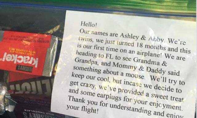 Sweet idea! Parents of twin toddlers give goodie bags to plane passengers